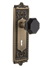 Load image into Gallery viewer, Nostalgic Warehouse 723804 Egg &amp; Dart Plate with Keyhole Double Dummy Waldorf Black Door Knob in Antique Brass

