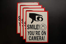 Load image into Gallery viewer, (4 Pack) Smile You&#39;re On Camera Warning Security Stickers 7&quot; X 5&quot; Vinyl Decal Indoor &amp; Outdoor (X4PS66)

